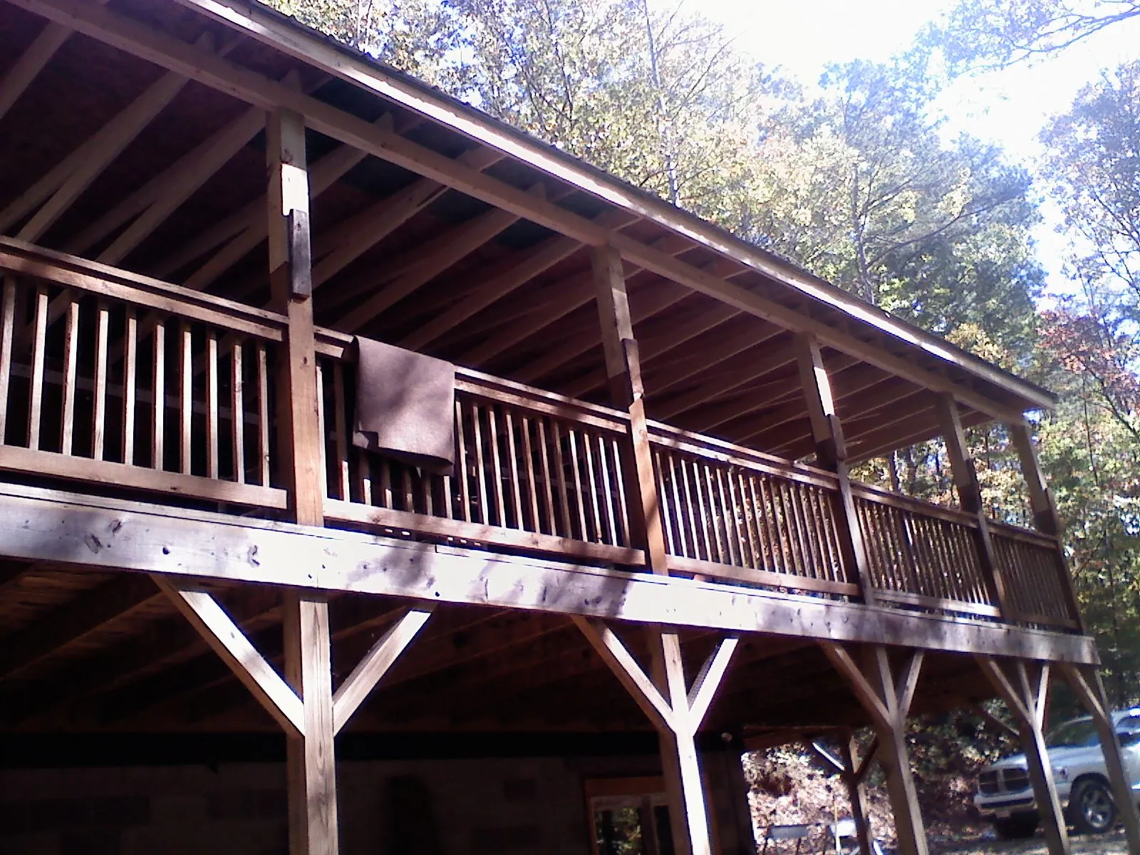 Timber framing under a new elevated porch and deck — Roof Leak Repair in Mehama by Roofing Brothers
